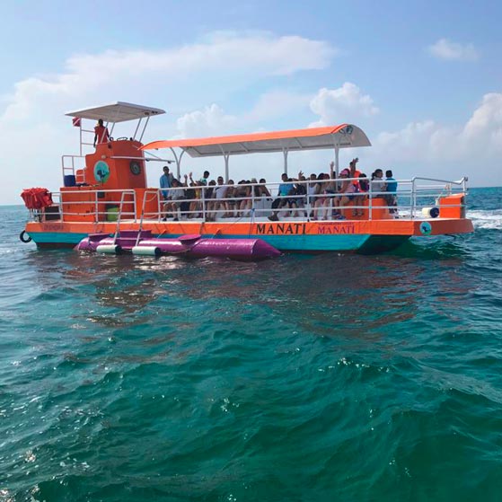 Manati Semi-Submarine - San Andres | Explore the underwater world without getting wet in a magical and safe experience.